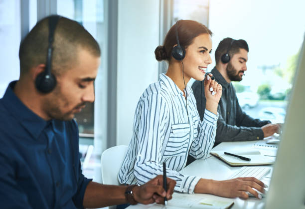 istock Working together in one big modern call centre 1197955002