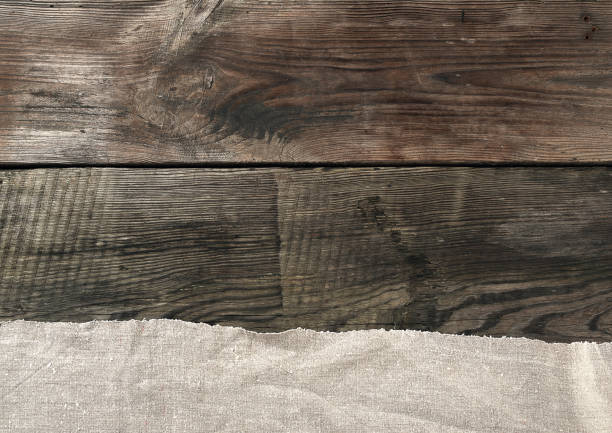 istock gray kitchen textile towel folded on a gray wooden table from old boards, top view 1197957738