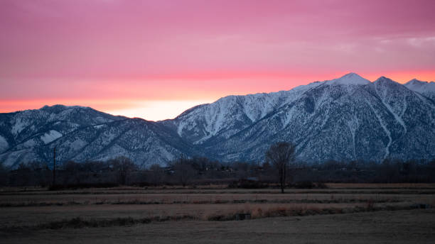 istock Red pink sunset behind the Sierra Nevada mountains 1197959505