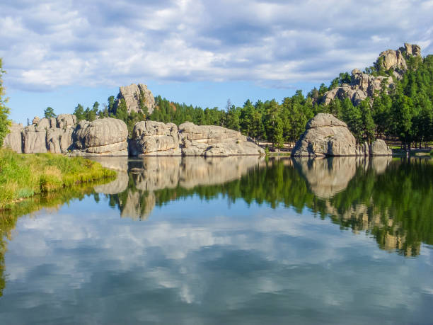 Mount Rushmore National Memorial - Keystone, South Dakota A tranquil lake on the grounds of Mount Rushmore National Memorial in Keystone, South Dakota in the heart of the Black Hills. keystone south dakota photos stock pictures, royalty-free photos & images