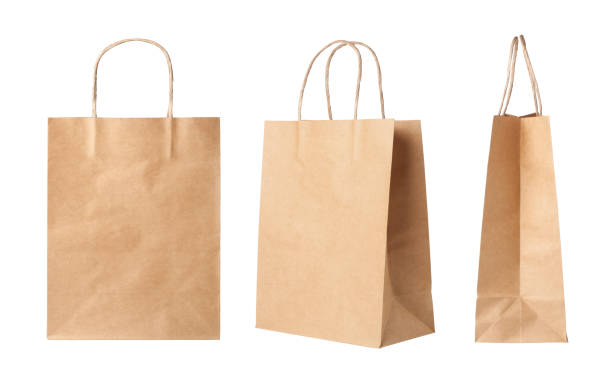 bolsas de compras de papel marrón - shopping bag white isolated blank fotografías e imágenes de stock