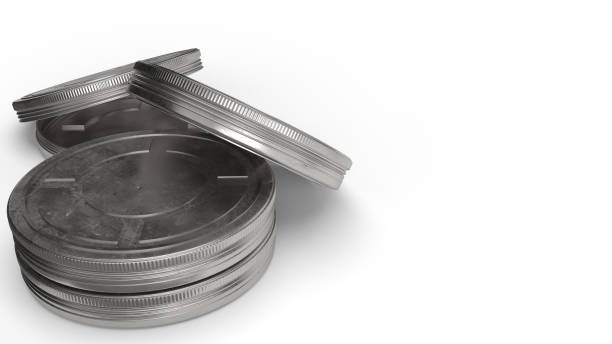istock film reel cases  on white background 3d rendering for behind the scene content. 1197970328