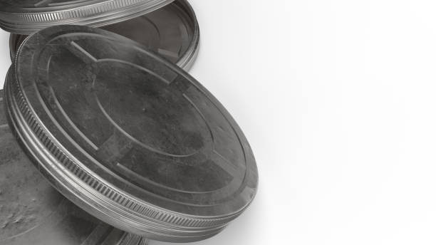 istock film reel cases  on white background 3d rendering for behind the scene content. 1197970358