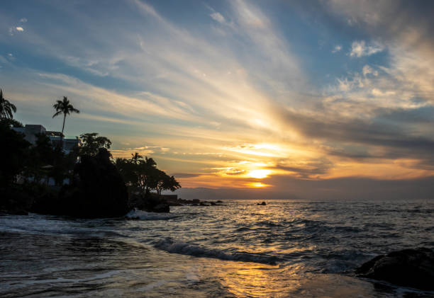 Sunset at the rocky beach - Puerto Vallarta, Jalisco, Mexico.