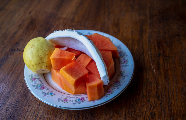 istock Tropical fruits plate on the table 1197971068