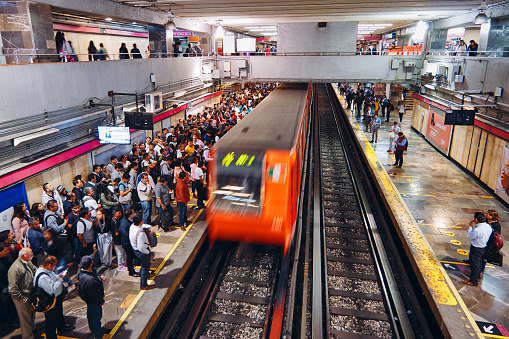 Subway of Chapultepec, Mexico City, October 16, 2019 - Rush hour in Chapultepec Metro Station. Group of crowded people waits for the metro in Mexico City