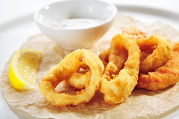 istock Breaded Fried Squid Rings and Shrimp with Tartar Sauce 1197976104