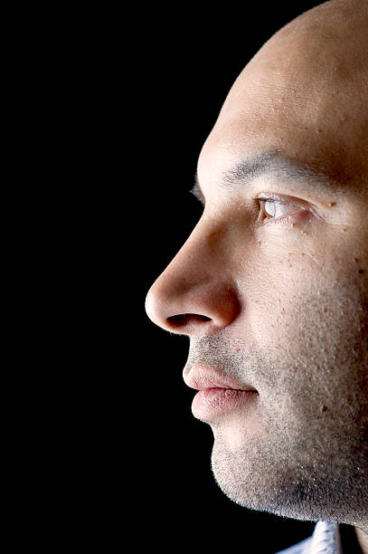 istock Man Portrait on Black closeup 119797988