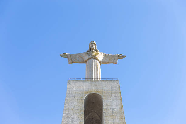 Lubango, Huila Province, Angola: The Statue of Christ the King with his arms outstretched is a religious monument erected at an altitude of 2,100 metres on the Serra da Chela and dedicated to Jesus Christ. It was designed by Civil Engineer Carlos Frazão Sardinha, inspired by the monument to Christ the King in Almada in Portugal, as a symbol of faith and devotion to Christianity. 'Cristo Rei'.