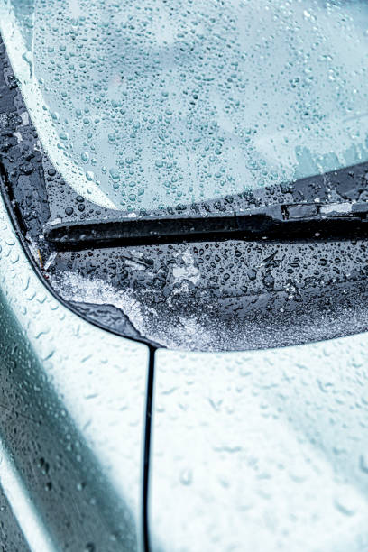 istock Ice Slush and Melting Water on Car Windshield 1197991574