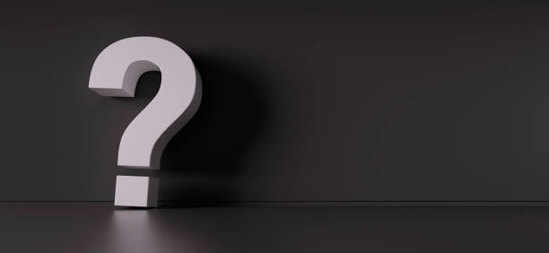 istock White Question Mark In Front Of dark Wall 1197992601