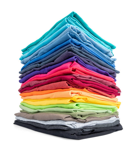 istock Stack of colorful t-shirt isolated on white background. File contains a path to isolation. 1197994032