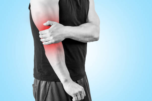 istock Man and elbow pain 1197994976