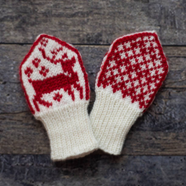 istock Knitted Baby Mittens 1198003291