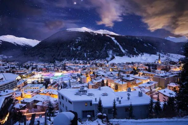 Photo of Davos city winter blue hour night scene. Davos, Switzerland