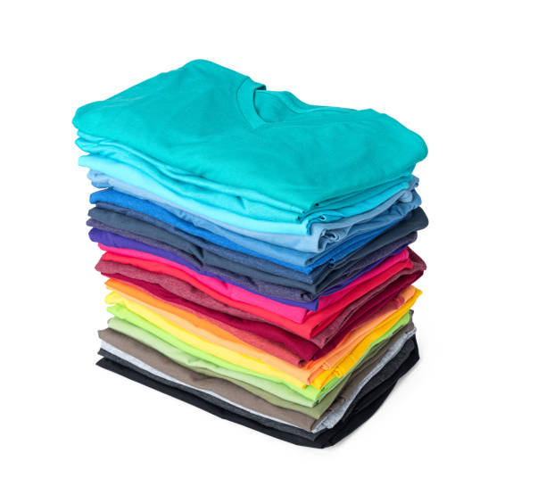 istock Stack of colorful t-shirt isolated on white background. File contains a path to isolation. 1198007054