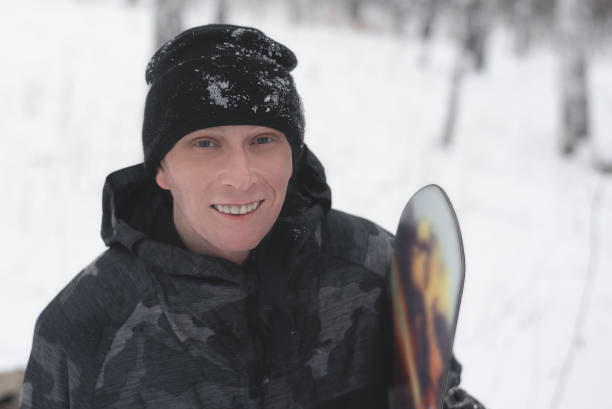 istock Amateur snowboarder. 1198007519