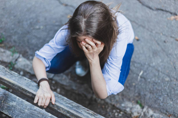 istock Person in grief and depression feeling uncomfortable 1198008231