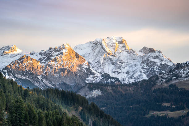 Alpine Mountains in a snow Beautiful view of the Alpine snowy Mountains in a Autumn day jungfrau stock pictures, royalty-free photos & images