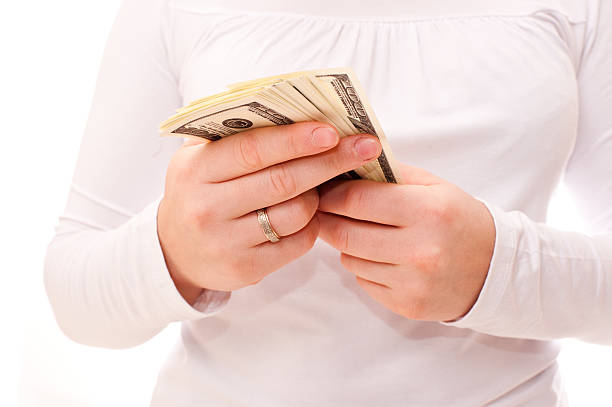 istock bundle of dollars in the hands 119801039