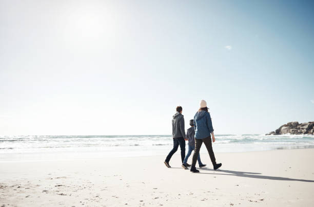 istock Long walks on the beach is perfect with family 1198010678