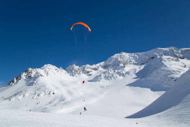 istock snowkite in the snowy mountains 1198014080