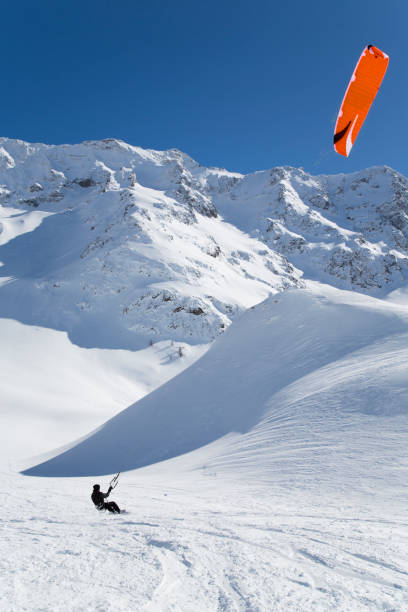 istock snowkite in the snowy mountains 1198014436