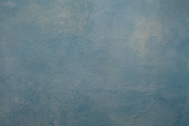 istock Blue stucco wall background texture. Grunge concrete plaster cement surface background 1198014651