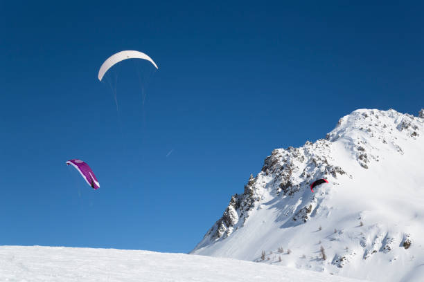 istock snowkite in the snowy mountains 1198015420