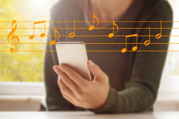 istock Listening music with mobile phone 1198015607