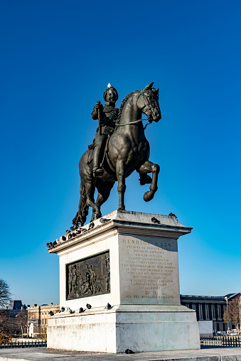 2019 The banks of the River Seine in Paris with the statue of Henrici Magni (King Henry IV) in the foreground. It was created in 1818.