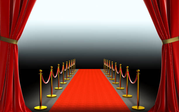 istock red curtains and carpet with barriers and satin cord. 1198020908