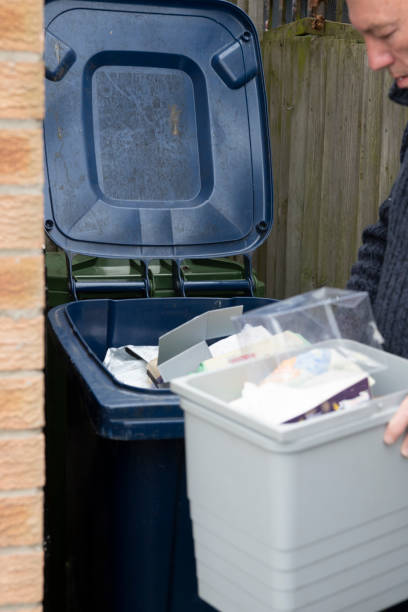 istock 2019 Senior man putting out recycling 1198025444