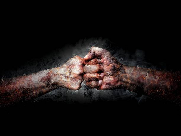 istock Fist and fist collide violently 1198025870