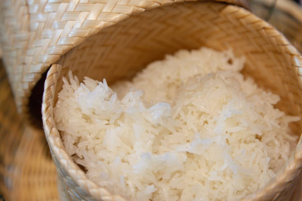 istock Wooden bamboo box with delicious Thai sticky rice 1198027009