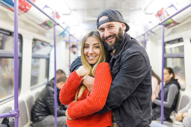 istock Couple in the subway train 1198029228