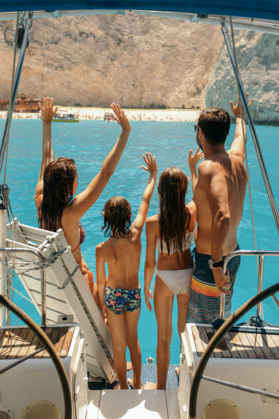 istock Family on sailboat 1198029490