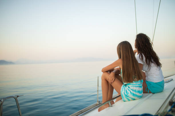 istock Mother and daughter enjoying on sailing 1198029538