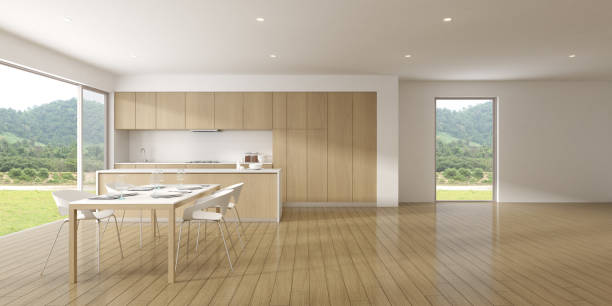 istock Perspective of modern luxury interior with dining table and modern kitchen cabinet,kitchen Island on nature background. 3D rendering. 1198030944