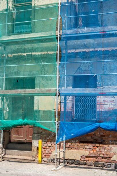 istock Scaffolding with safety net House 1198035381