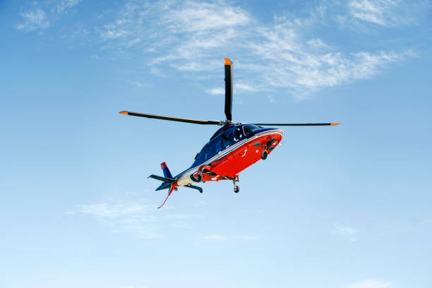 istock Solo helicopter in blue skies 1198036078