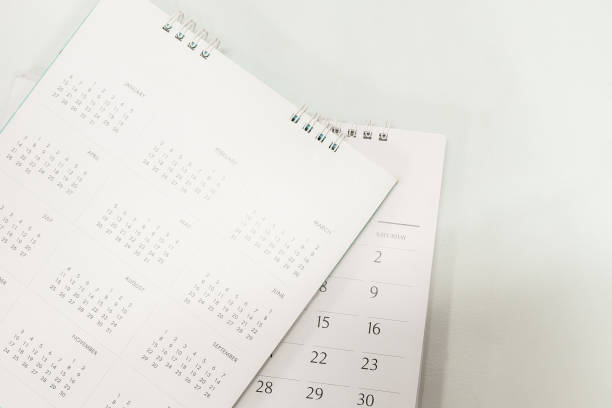 istock Blurred calendar in planning concept.White tone. 1198037317