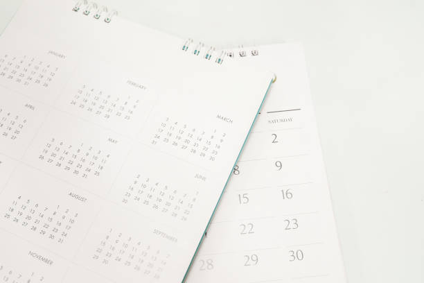 istock Blurred calendar in planning concept.White tone. 1198037327