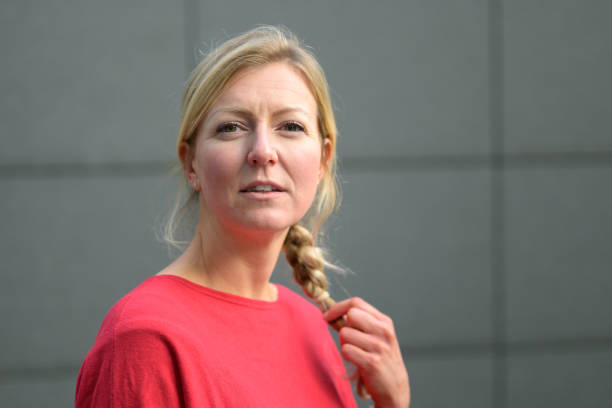 istock Attractive middle-aged blond woman with plait 1198037647