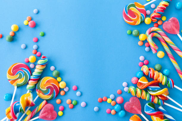 istock Colorful sweets on a blue background 1198039016