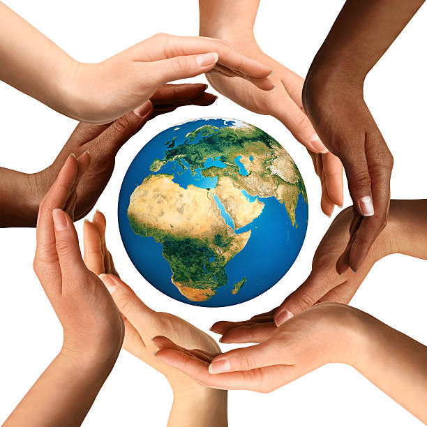 istock Multiracial Hands Surrounding the Earth Globe 119804067