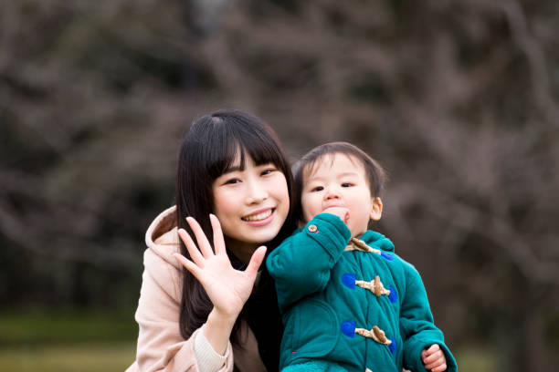 istock Parent and child (mother and boy) looking at camera 1198042785