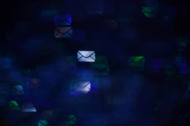istock Dark blue mail shaped bokeh. Envelope business concept. 1198046425