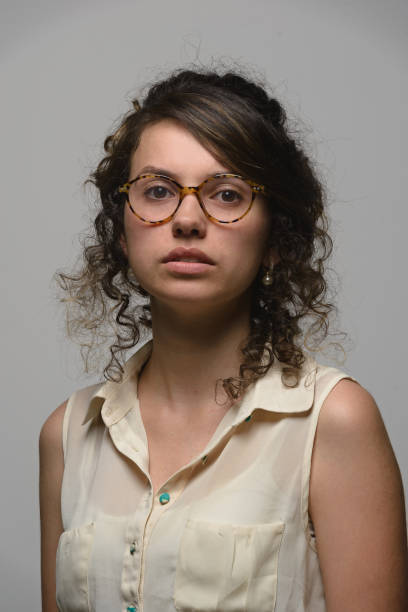 istock Latino woman with glasses 1198056384