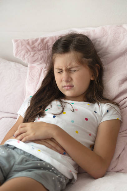istock Child having stomach ache 1198057566